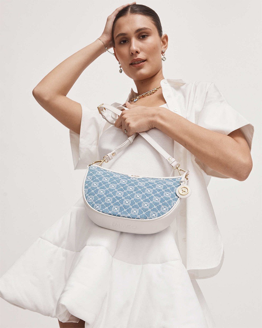 Washed Denim MimGram Crescent Crossbody Bag Bags Mimco