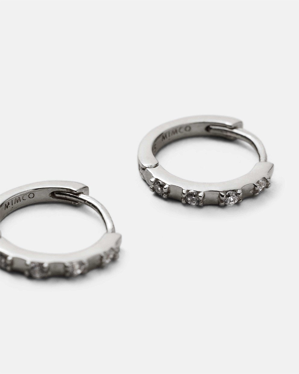 Vela Huggie Hoop Earrings